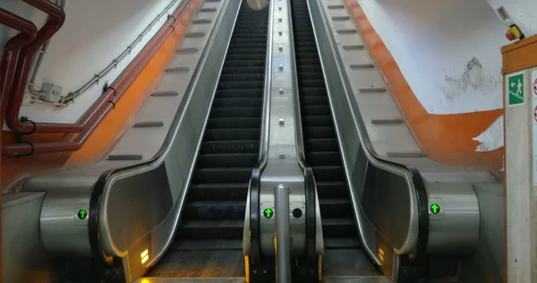 Empty underground escalator moving up — Stock Photo, Image