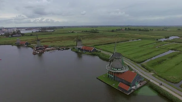 Windmills and fields in Dutch village, aerial view — Stock Photo, Image