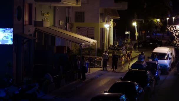 People Walking Along Street At Night — Stock Video