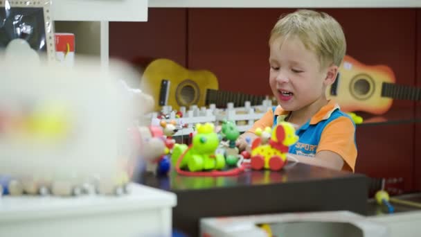 Boy playing with toys — Stock Video