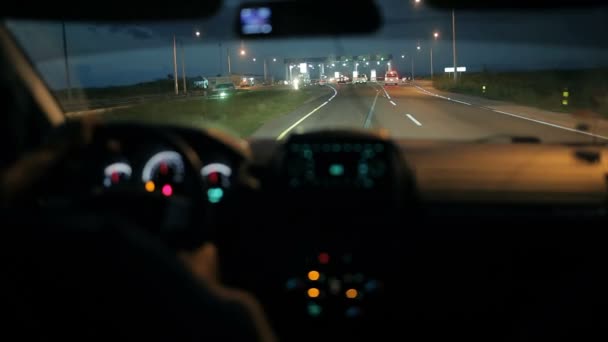 Car at the toll collection point at night — Stock Video