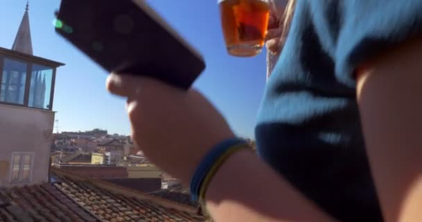 Woman on the balcony having tea and making sketches — Stock videók