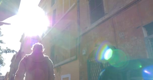 Woman with pad walking outdoor on sunny day — Stock videók