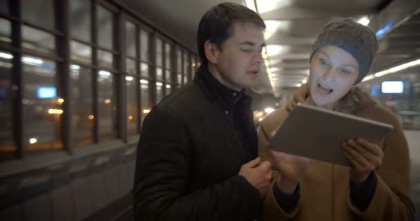 Couple Planning Their Evening with Tablet PC — Stock Video