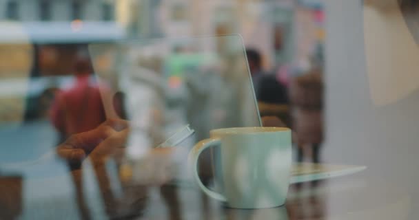 They having tea while using phone and laptop — Stock Video