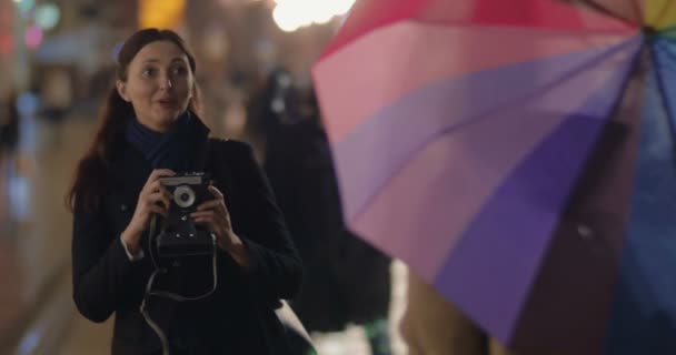 Woman is Taking Photo with Vintage Camera — стокове відео