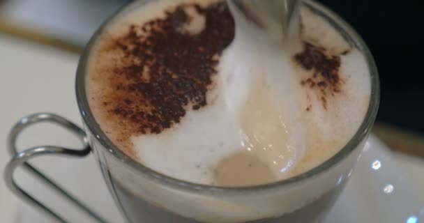 Taking tasty foam from coffee — Stock Video