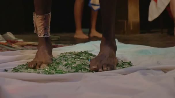 Yogi man stepping on broken glass — Stock video