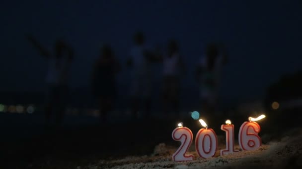 Lit candles as symbol of New Year 2016 — Stock Video