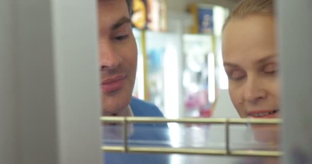 Man and woman in the perfumery — Stock Video