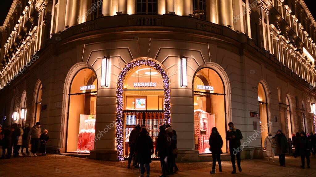 Warsaw, Poland. 25 December 2020. Entrance to Hermes store located in Hotel Raffles Europejski Warsaw. Hermes is a high-end retailer carrying the luxury brand's apparel, handbags, scarves and other