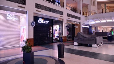 Warsaw, Poland. 15 March 2021.Empty Arkadia Westfield shopping center. The city empties of tourists and people. Stop the coronavirus. clipart