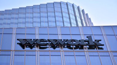 Warsaw. Poland. 11 April 2021. Sign  Wework. Company signboard Wework.