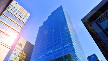 Modern luxury office building.The structure features a glass walls, showcasing contemporary architecture.
