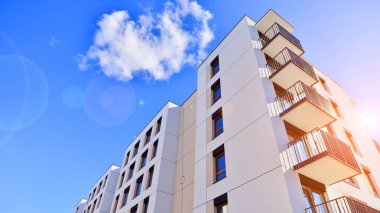 New modern block of flat, condo architecture. Residential apartment flat, luxury house complex. City real estate property.