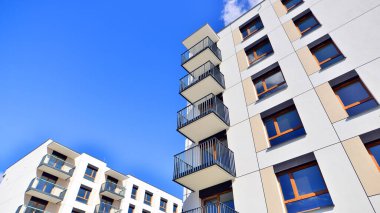 New modern block of flat, condo architecture. Residential apartment flat, luxury house complex. City real estate property.