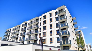 New modern block of flat, condo architecture. Residential apartment flat, luxury house complex. City real estate property.