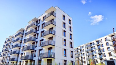 New modern block of flat, condo architecture. Residential apartment flat, luxury house complex. City real estate property.