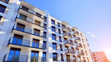 New modern block of flat, condo architecture. Residential apartment flat, luxury house complex. City real estate property.