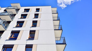 New modern block of flat, condo architecture. Residential apartment flat, luxury house complex. City real estate property.