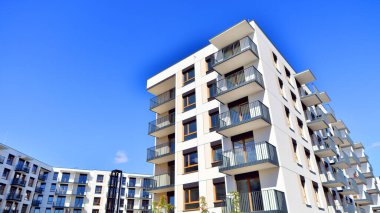 New modern block of flat, condo architecture. Residential apartment flat, luxury house complex. City real estate property.