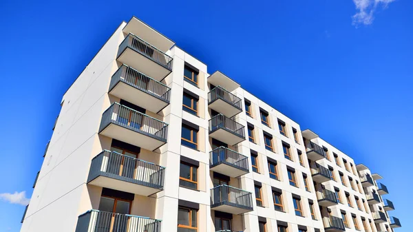 New modern block of flat, condo architecture. Residential apartment flat, luxury house complex. City real estate property.