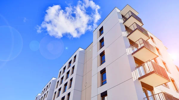 New modern block of flat, condo architecture. Residential apartment flat, luxury house complex. City real estate property.