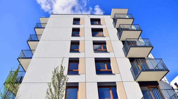 New modern block of flat, condo architecture. Residential apartment flat, luxury house complex. City real estate property.