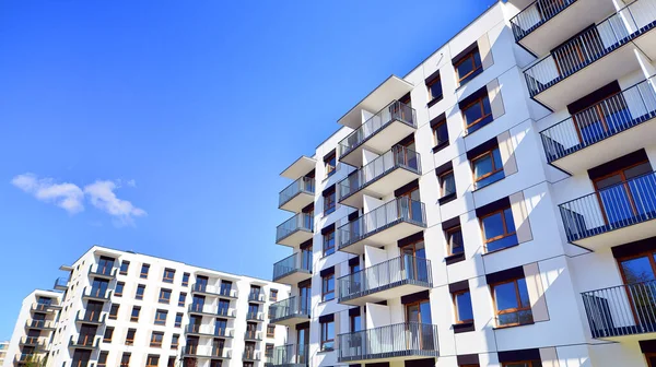 New modern block of flat, condo architecture. Residential apartment flat, luxury house complex. City real estate property.