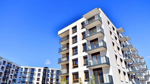 New modern block of flat, condo architecture. Residential apartment flat, luxury house complex. City real estate property.