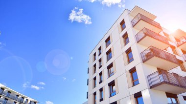 New modern block of flat, condo architecture. Residential apartment flat, luxury house complex. City real estate property.