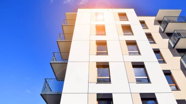 New modern block of flat, condo architecture. Residential apartment flat, luxury house complex. City real estate property.