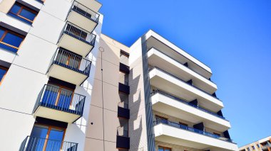 New modern block of flat, condo architecture. Residential apartment flat, luxury house complex. City real estate property.