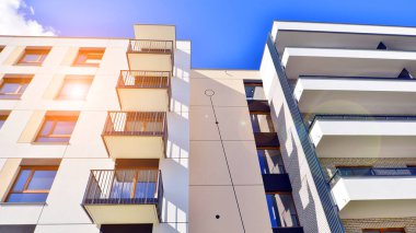 New modern block of flat, condo architecture. Residential apartment flat, luxury house complex. City real estate property.