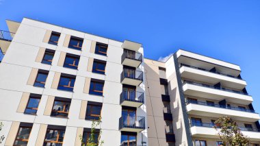 New modern block of flat, condo architecture. Residential apartment flat, luxury house complex. City real estate property.