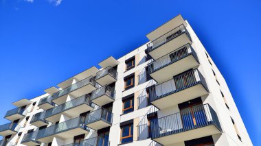 New modern block of flat, condo architecture. Residential apartment flat, luxury house complex. City real estate property.