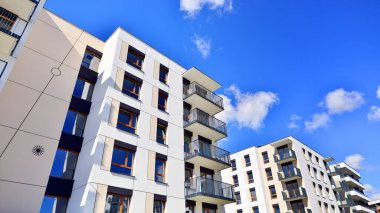 New modern block of flat, condo architecture. Residential apartment flat, luxury house complex. City real estate property.