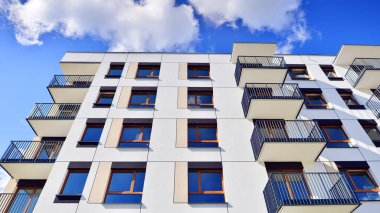 New modern block of flat, condo architecture. Residential apartment flat, luxury house complex. City real estate property.