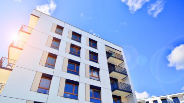 New modern block of flat, condo architecture. Residential apartment flat, luxury house complex. City real estate property.