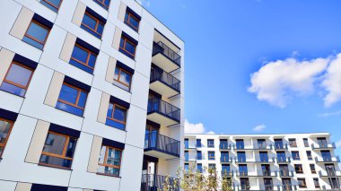 New modern block of flat, condo architecture. Residential apartment flat, luxury house complex. City real estate property.