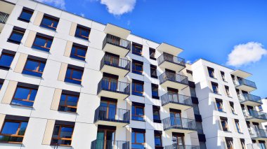 New modern block of flat, condo architecture. Residential apartment flat, luxury house complex. City real estate property.