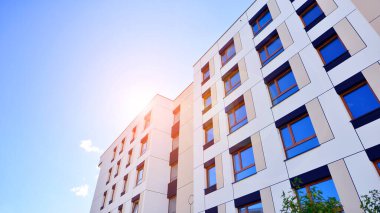 New modern block of flat, condo architecture. Residential apartment flat, luxury house complex. City real estate property.