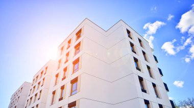 New modern block of flat, condo architecture. Residential apartment flat, luxury house complex. City real estate property.