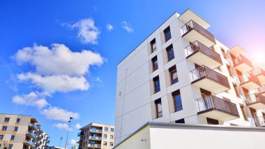 New modern block of flat, condo architecture. Residential apartment flat, luxury house complex. City real estate property.