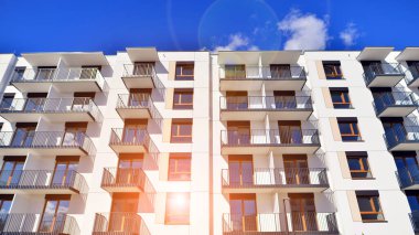 New modern block of flat, condo architecture. Residential apartment flat, luxury house complex. City real estate property.