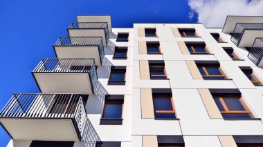 New modern block of flat, condo architecture. Residential apartment flat, luxury house complex. City real estate property.