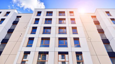 New modern block of flat, condo architecture. Residential apartment flat, luxury house complex. City real estate property.