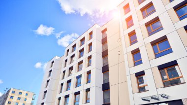 New modern block of flat, condo architecture. Residential apartment flat, luxury house complex. City real estate property.