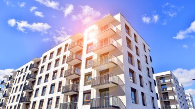 New modern block of flat, condo architecture. Residential apartment flat, luxury house complex. City real estate property.