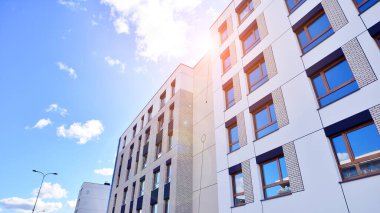 New modern block of flat, condo architecture. Residential apartment flat, luxury house complex. City real estate property.